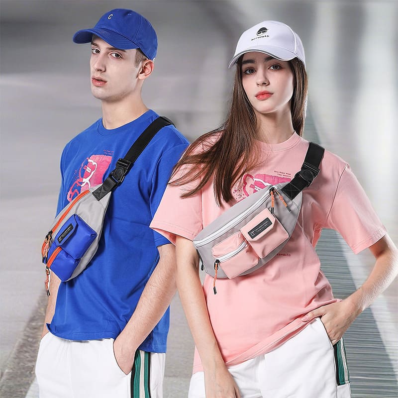 Two models, a man and a woman, show the effect of a blue breast bag and a pink Fanny pack on the top