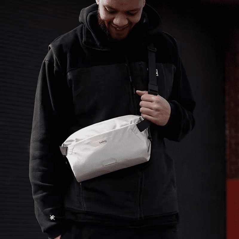A model show off the Lightweight crossbody bag for shoulder outside riding chest waist bag