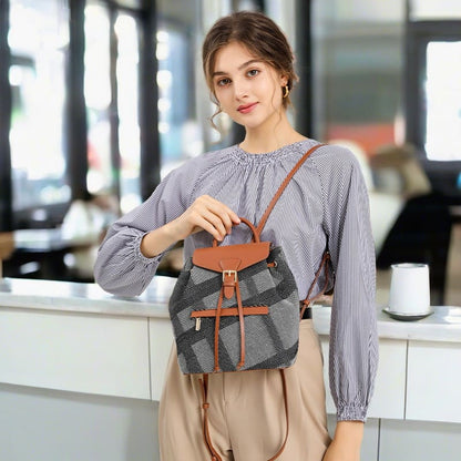 A female model presents a brown cotton and linen women's daily glamour women's backpack upper body effect product image