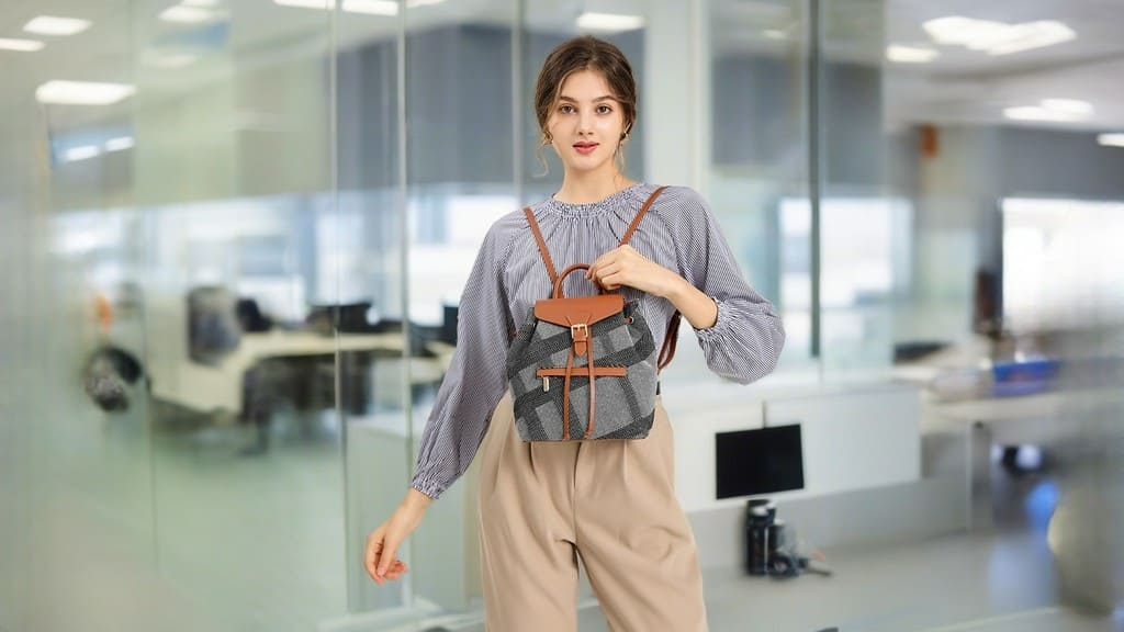 A female model presents a brown cotton and linen women's daily glamour women's backpack upper body effect product image4