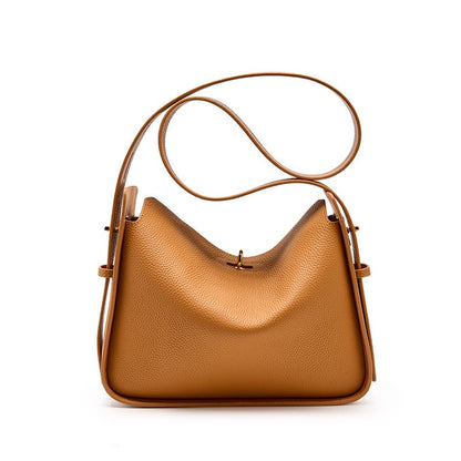 A brown Litchi Grain Leather Wide Strap Hobo Twist-Lock Crossbody shoulder bag