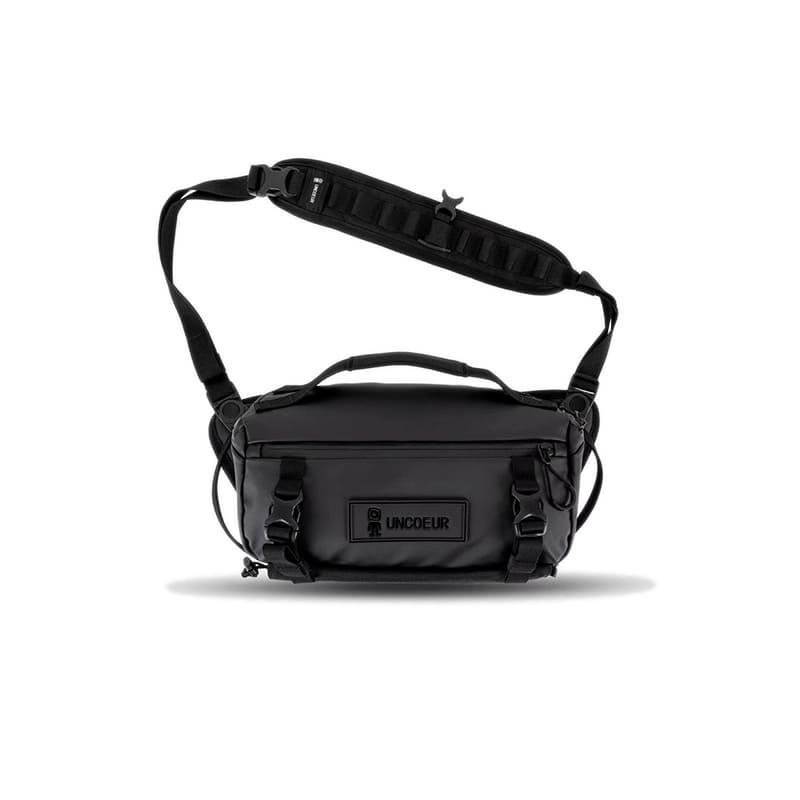 A black Rogue Sling Molle camera bag Photography kit bag protection gear
