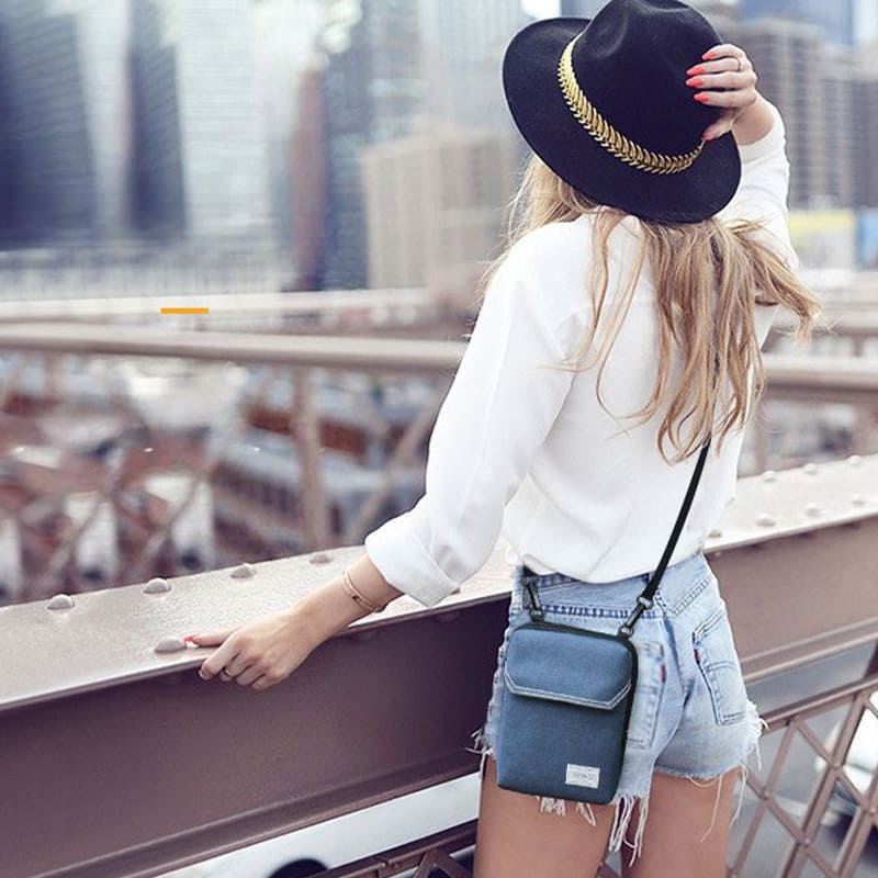 A Modle Show Off The Blue Daily Oxford Shoulder Crossbody Small Bag for Minimalist carry-on bag